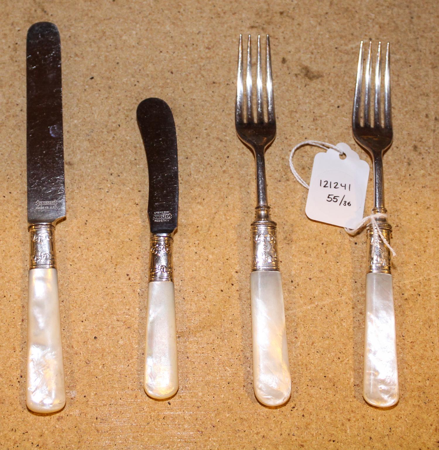 An American Silver and Mother-of-Pearl Flatware Service, , comprising 12 knives, 12 forks and 12 butter spreaders.