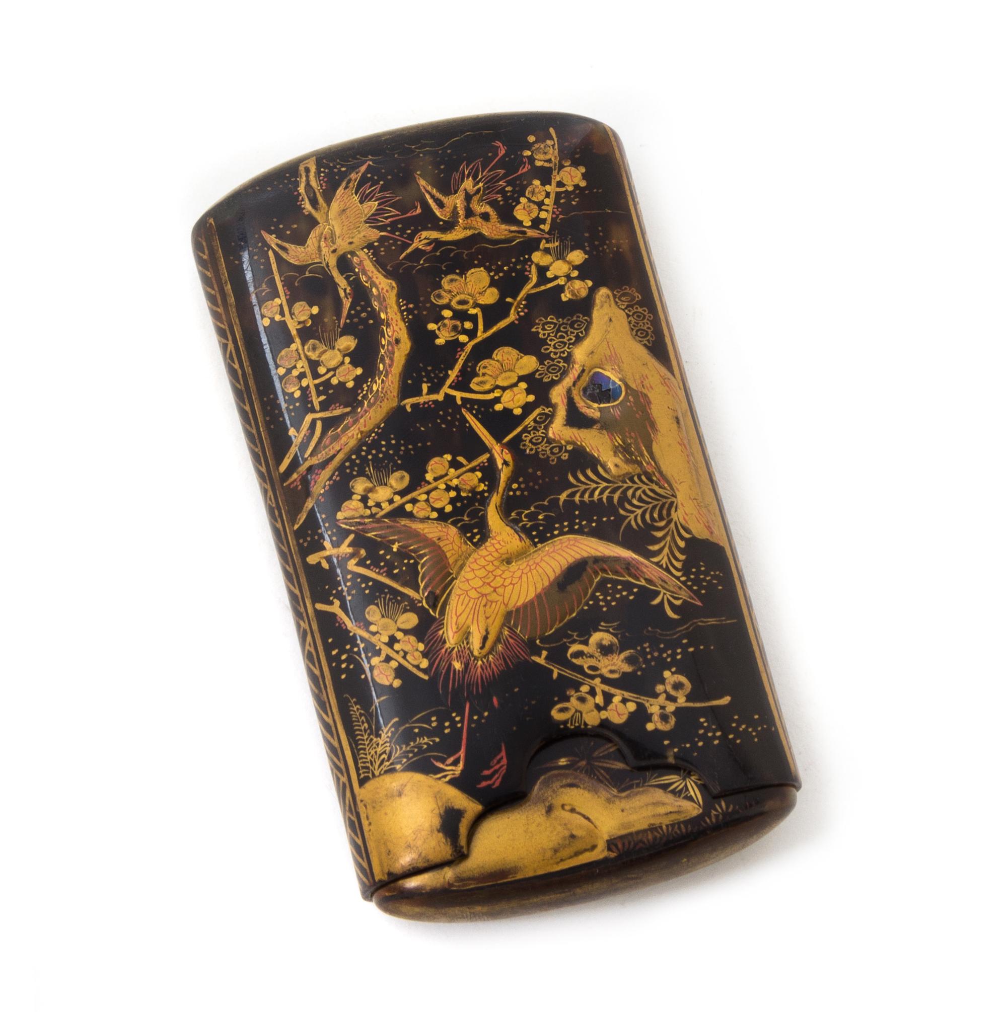 A Gilt Decorated Tortoise Shell Case Height 4 3/4 inches.