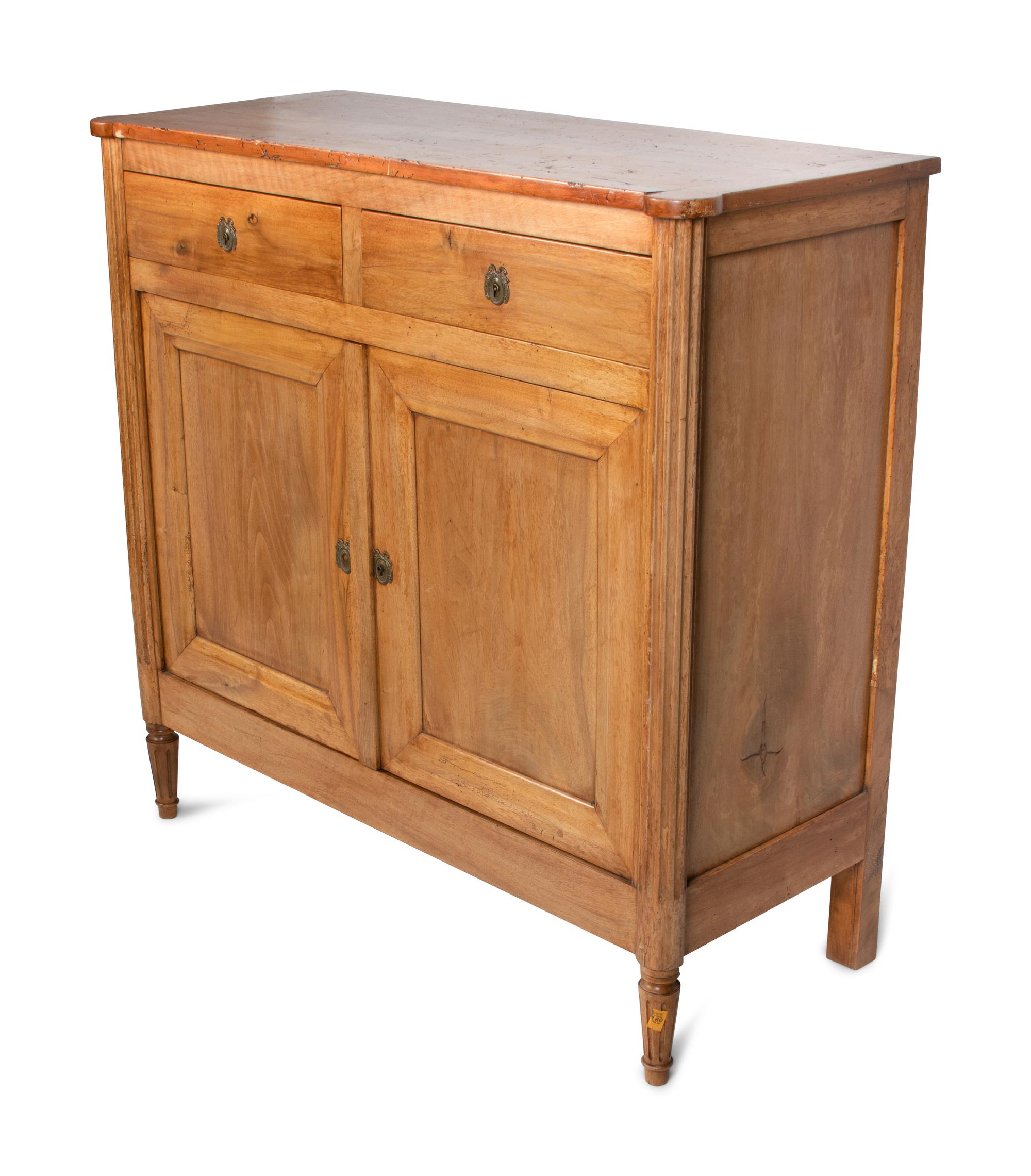 A Louis XVI Fruitwood Cabinet