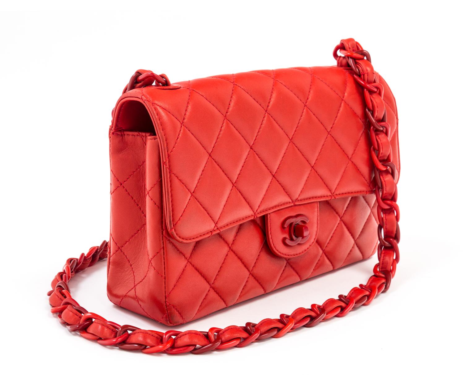 A Chanel Red Lambskin Quilted Flap Bag, 10" x 7" x 2.75"; Strap drop: 19".