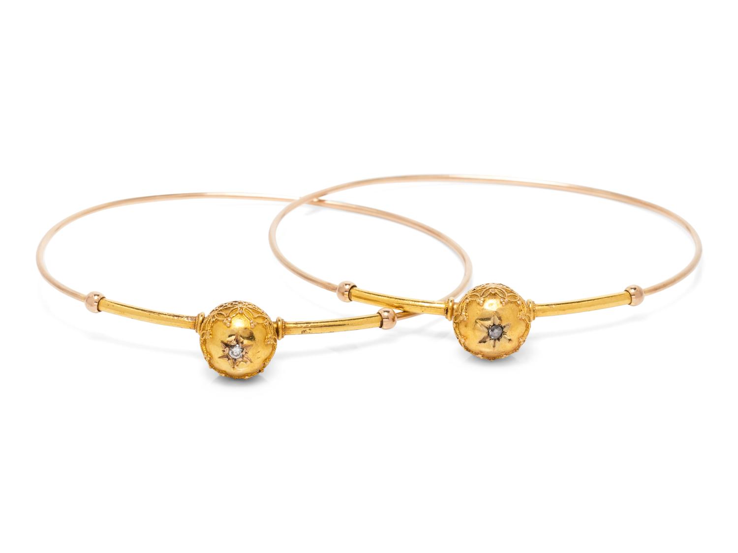 A Pair of Yellow Gold and Diamond Bangle Bracelets,