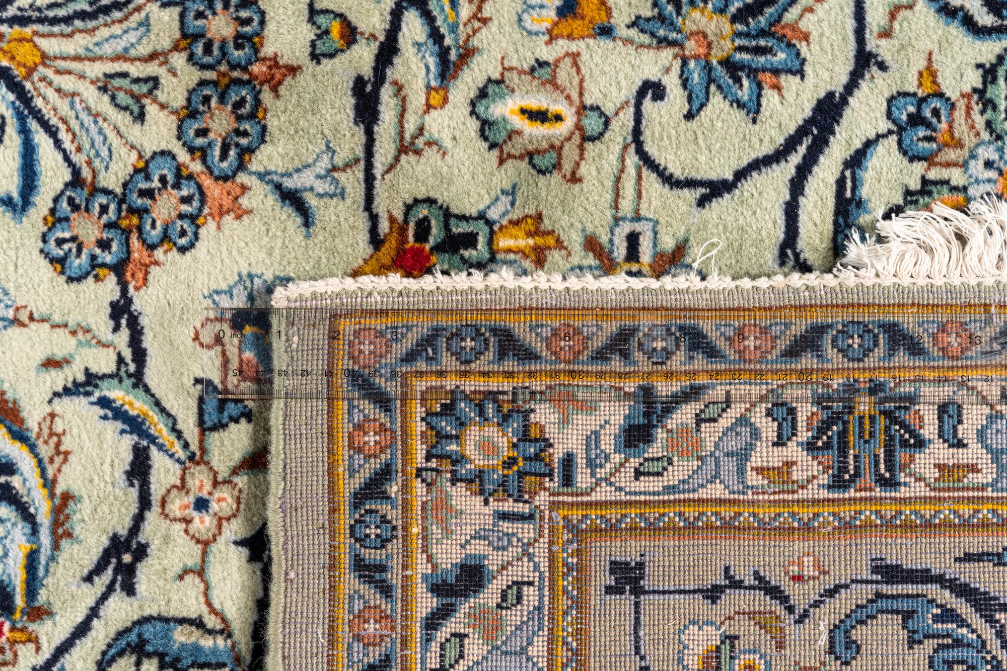 A Kashan Wool Rug