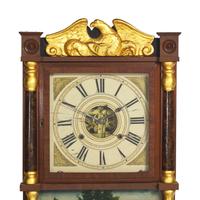 A Classical Parcel-Gilt Mahogany Shelf Clock with Double Eglomise Panels