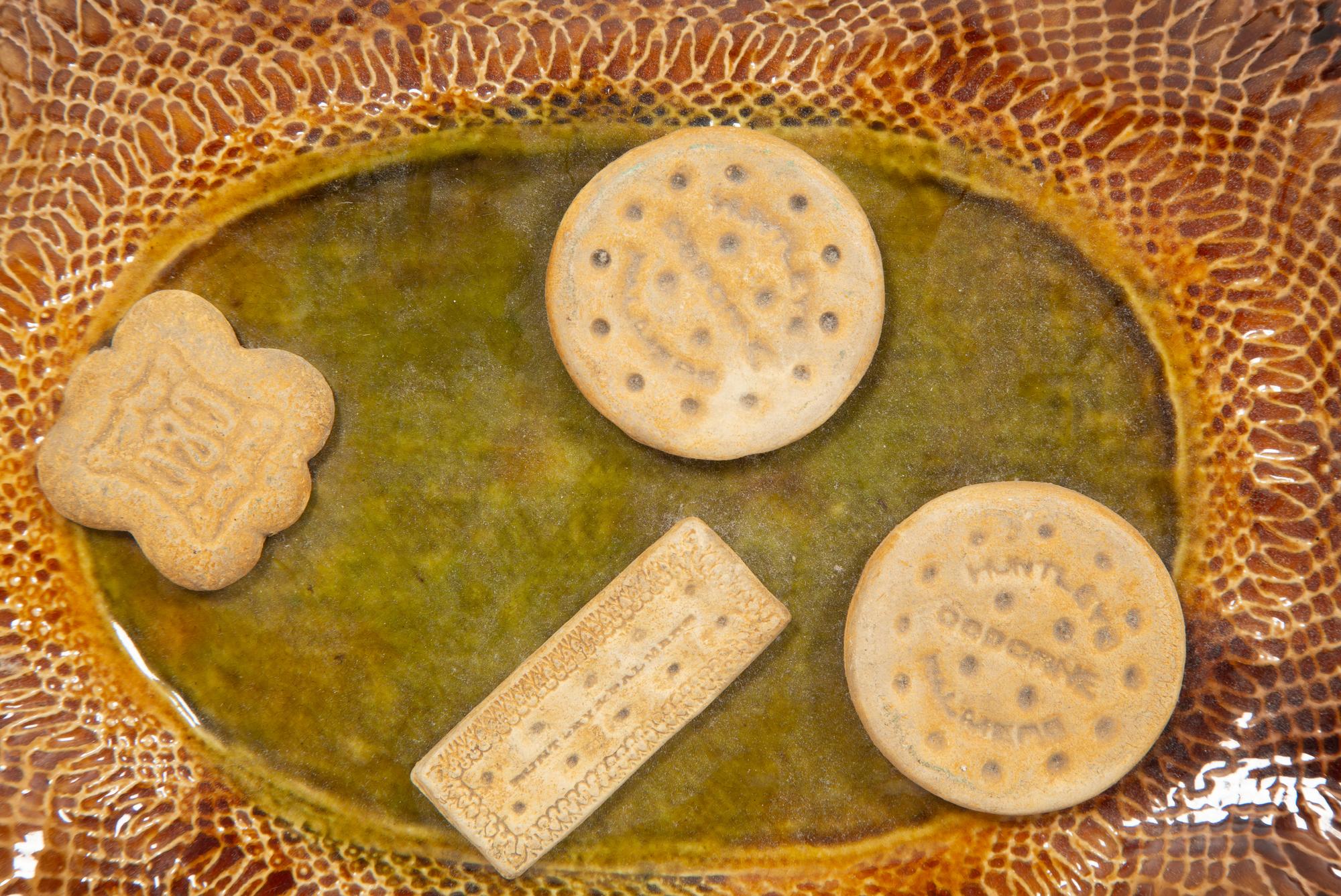 Two Bretby Pottery Trompe-l'œil Plates