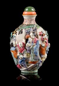 A Molded Famille Rose Porcelain Snuff Bottle Height 3 1/2 inches. — 19TH CENTURY