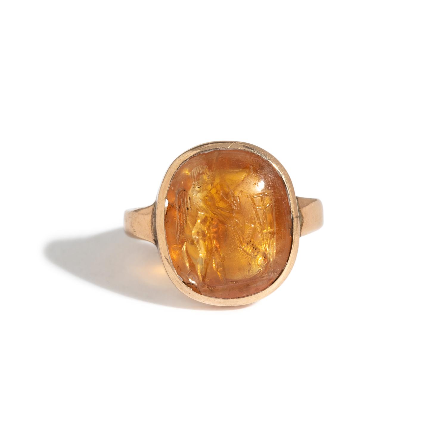 A Neoclassical Gold and Citrine Finger Ring with the God Eros
