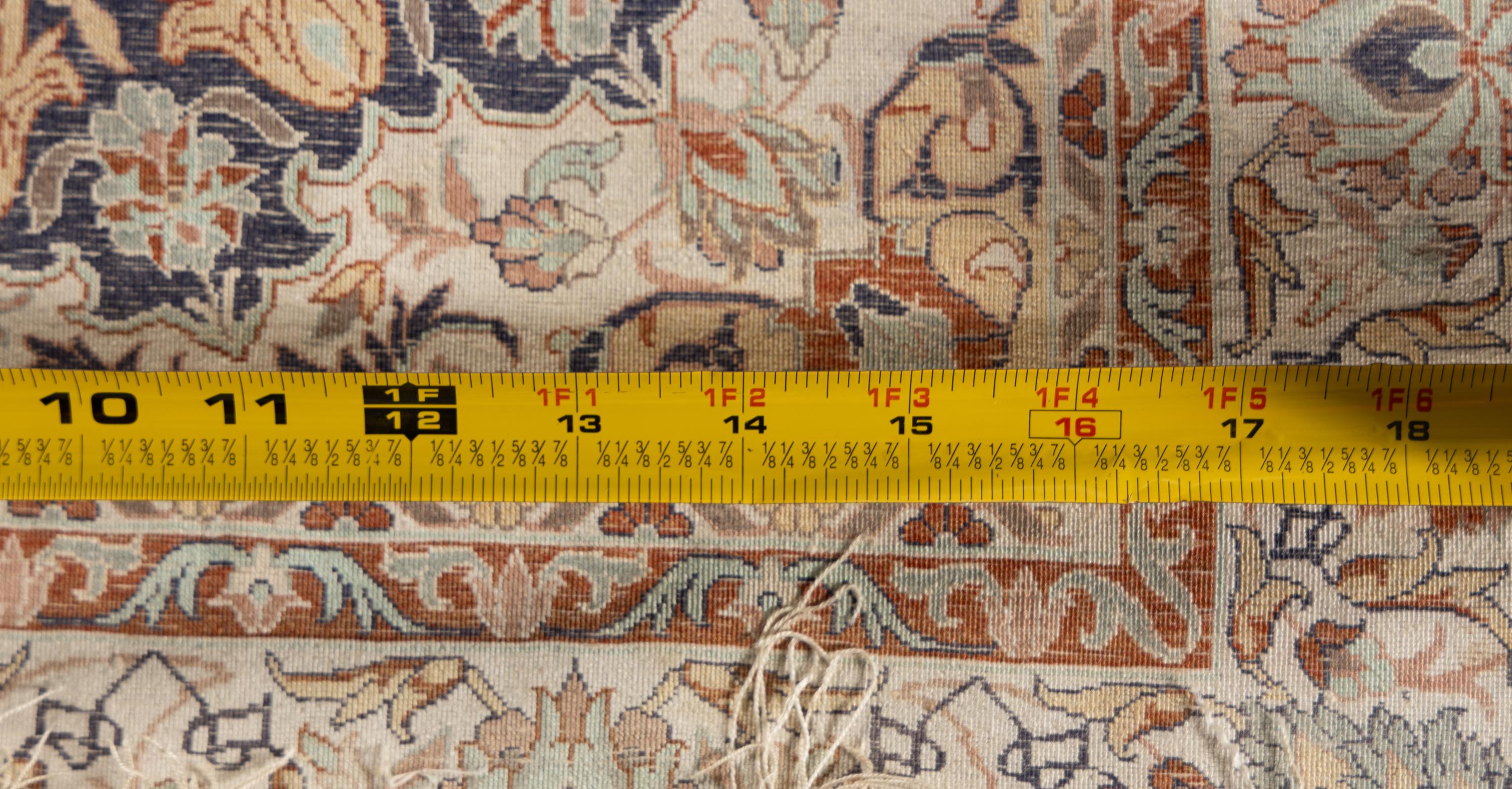 A Group of Five Silk Mats