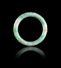 A Chinese Apple Green and Celadon Jadeite Bangle