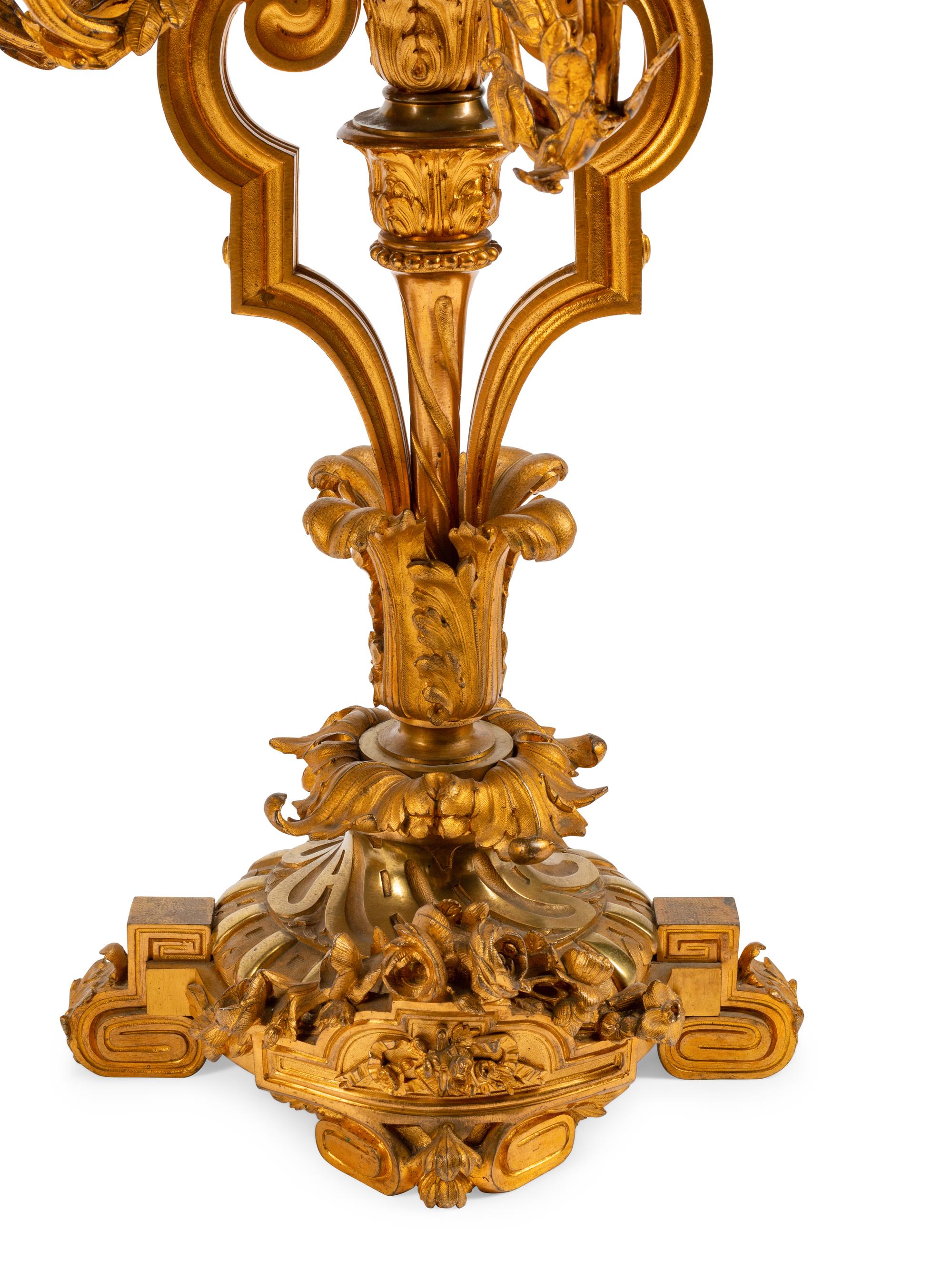 A Pair of Louis XVI Style Gilt Bronze Nine-Light Candelabra