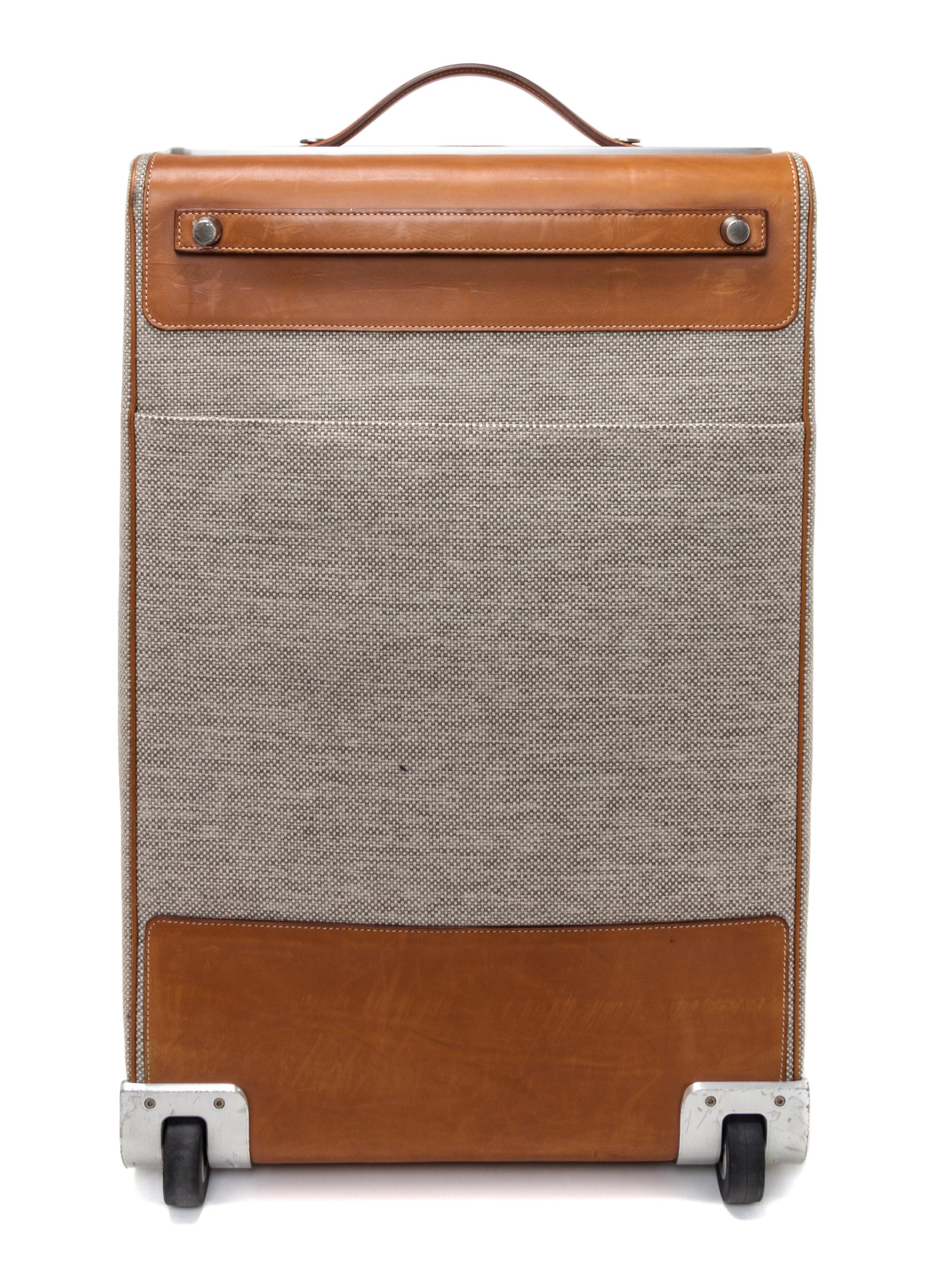 An Hermes Ecru Canvas and Fawn Barenia Calfskin Caleche-Express Suitcase, 14" x 21.5" x 10".