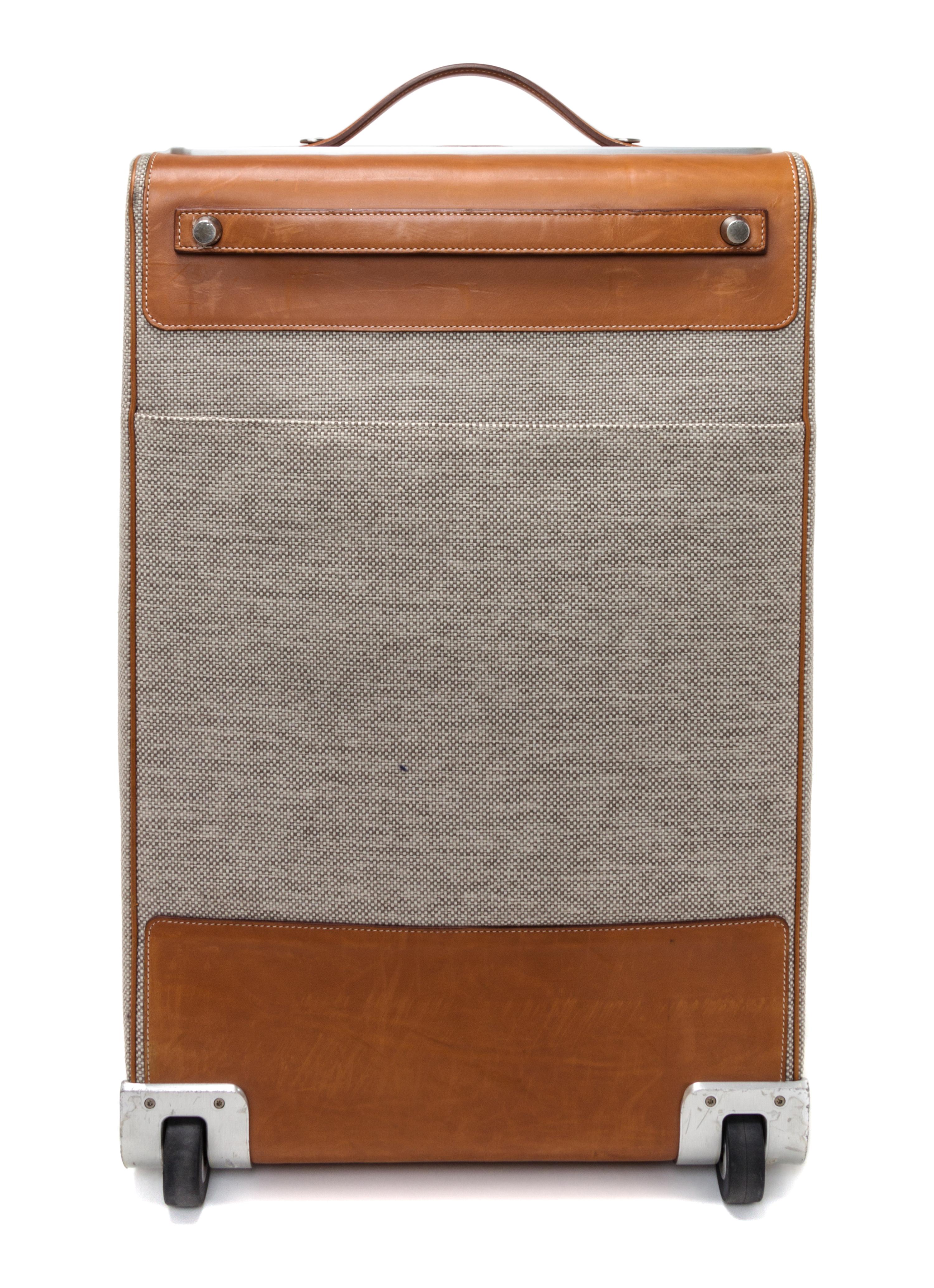 An Hermes Ecru Canvas and Fawn Barenia Calfskin Caleche-Express Suitcase, 14" x 21.5" x 10".