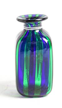 An Iridescent Glass Bottle Height 3 1/2 inches.