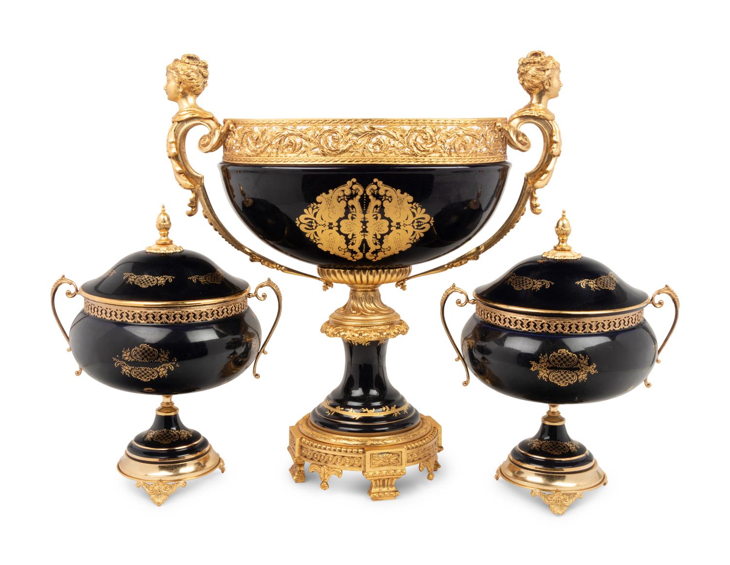 A Louis XV Limoges Style Gilt Bronze Mounted Porcelain Table Garniture