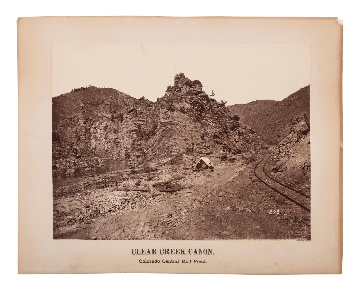 [COLORADO]. [SAVAGE, Charles R., photographer]. Photograph of photographer's trackside studio tent, Clear Creek Canon, CO.