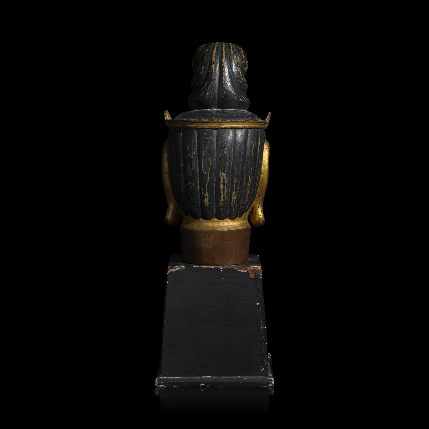 A Japanese Gilt and Black Painted Wood Head of a Bosatsu