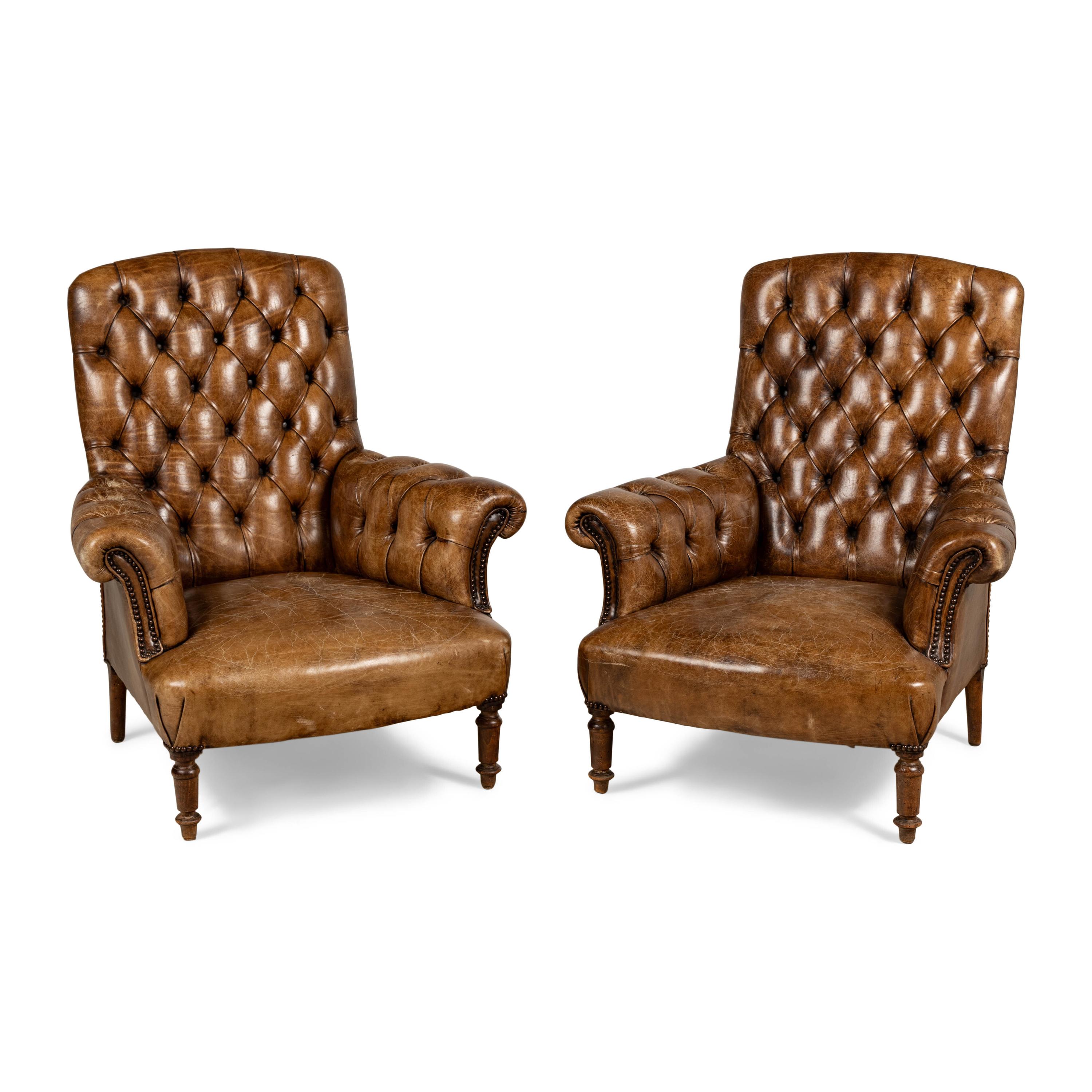 A Pair of English Button-Tufted Leather Armchairs