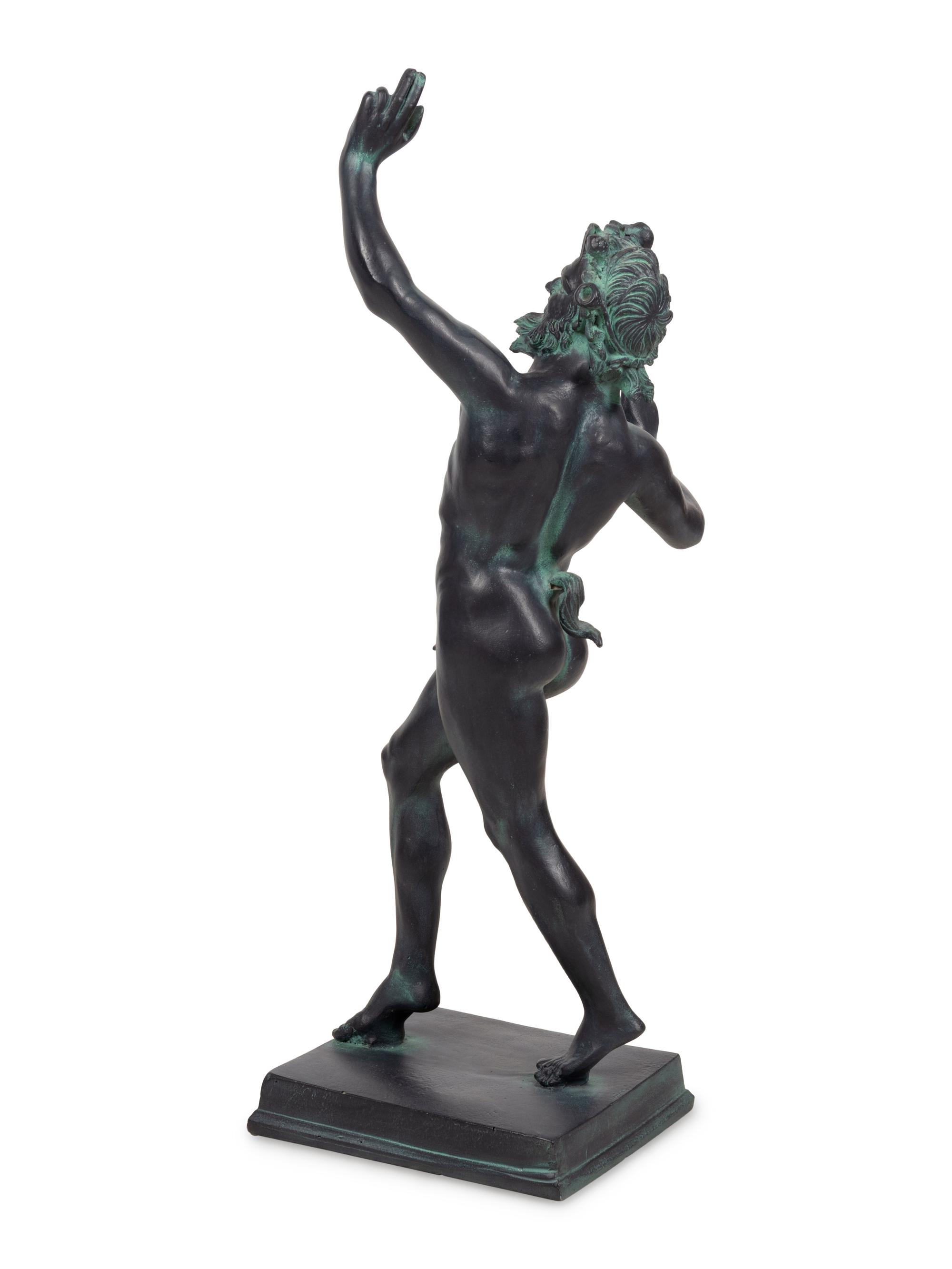 A Patinated Cast Resin Figure of the Faun of Pompeii