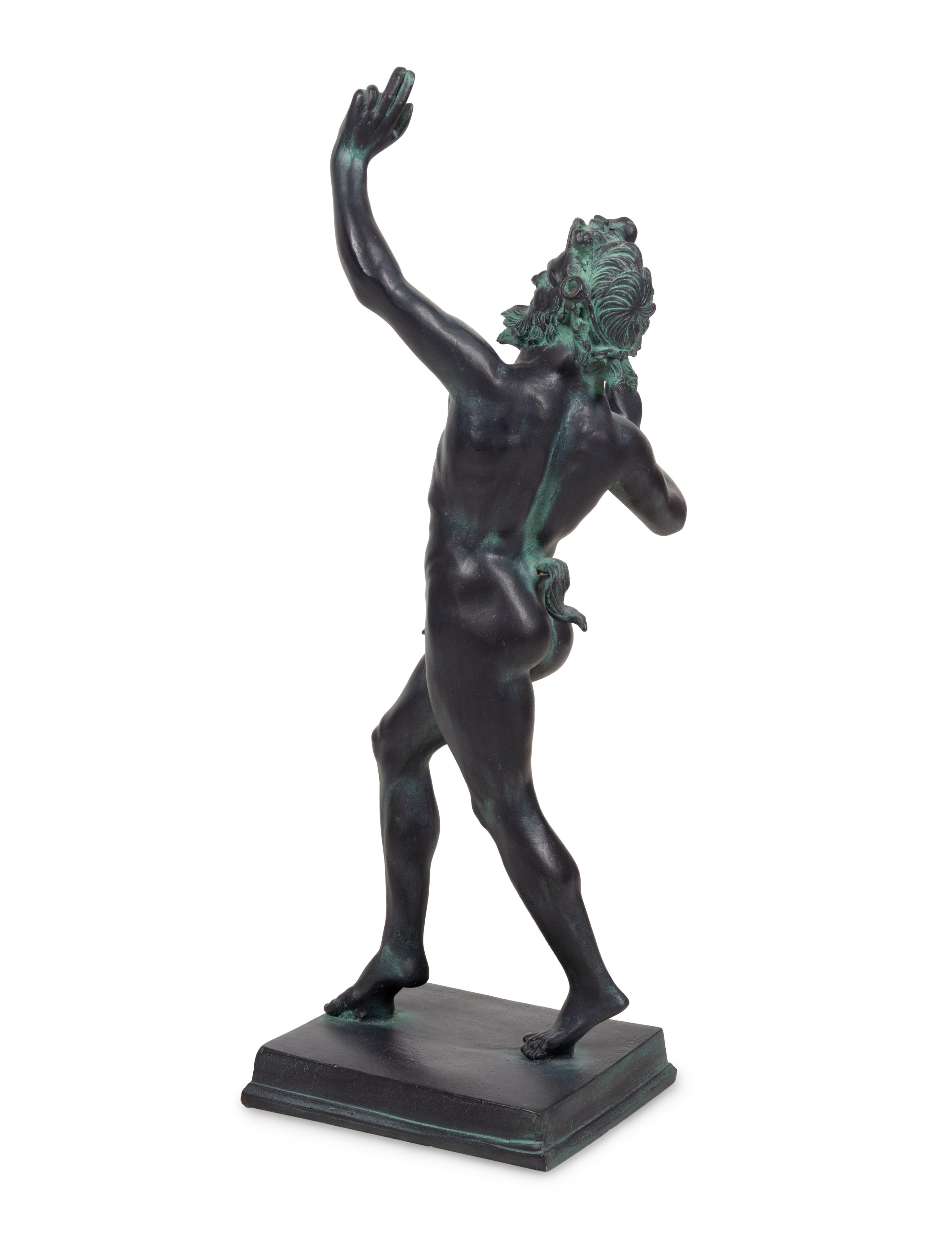 A Patinated Cast Resin Figure of the Faun of Pompeii