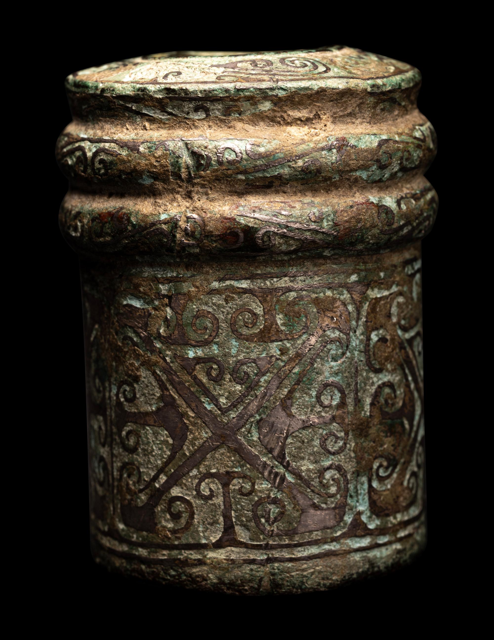 A Chinese Silver Inlaid Bronze Chariot Axle Fitting