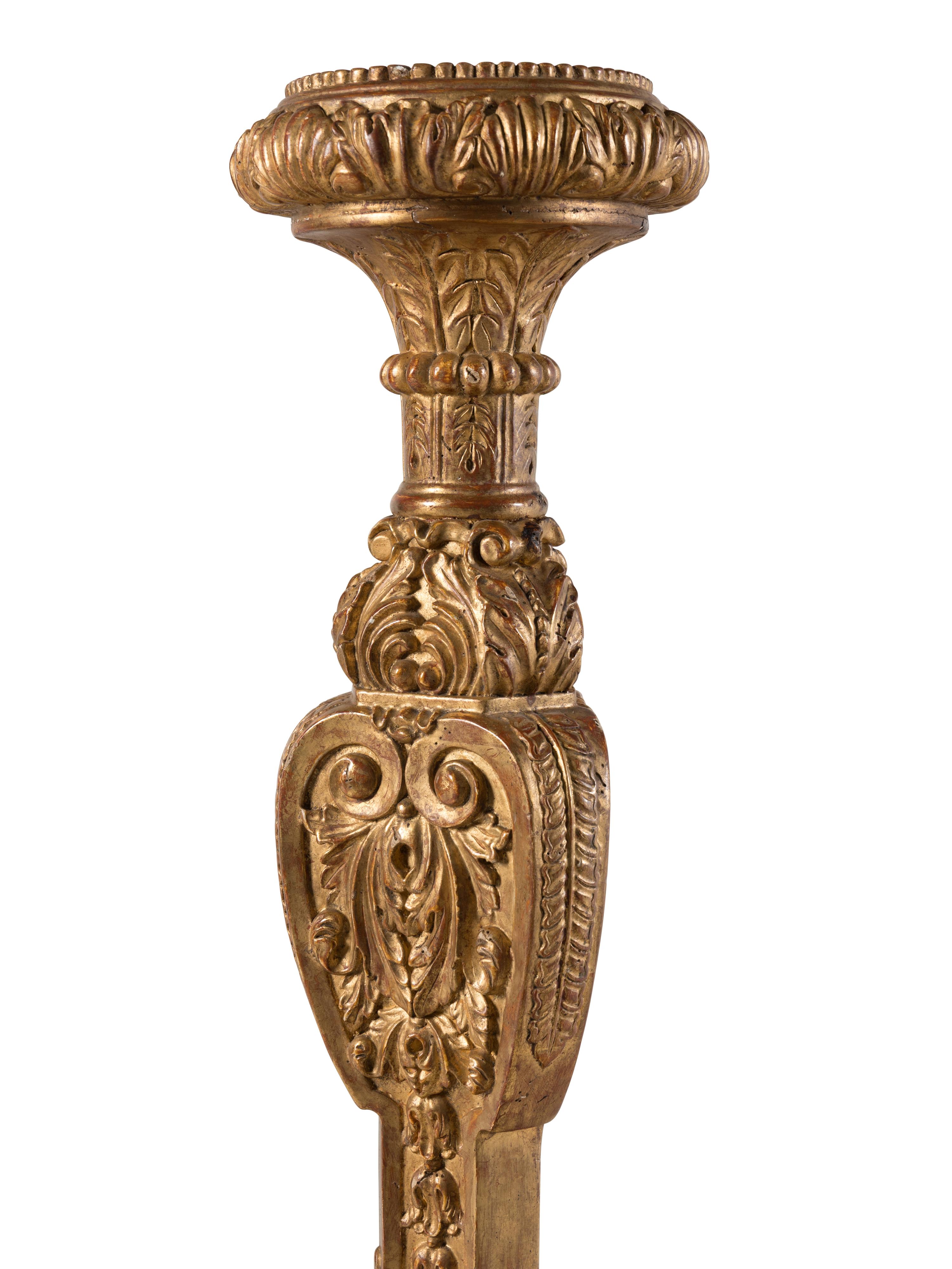 A Pair of Italian Baroque Style Giltwood Torchères