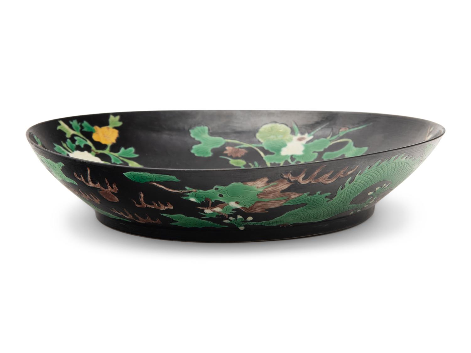 A Chinese Black Ground Famille Verte Porcelain Plate