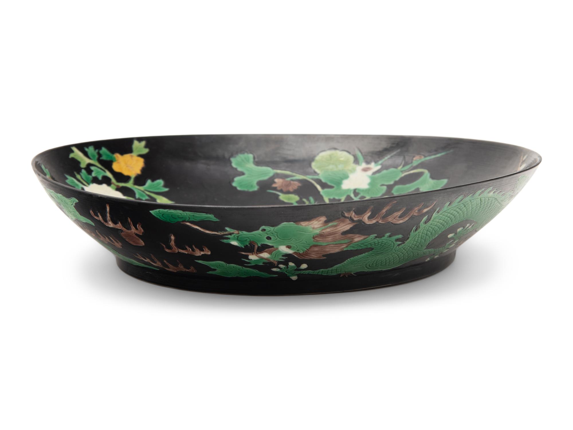 A Chinese Black Ground Famille Verte Porcelain Plate