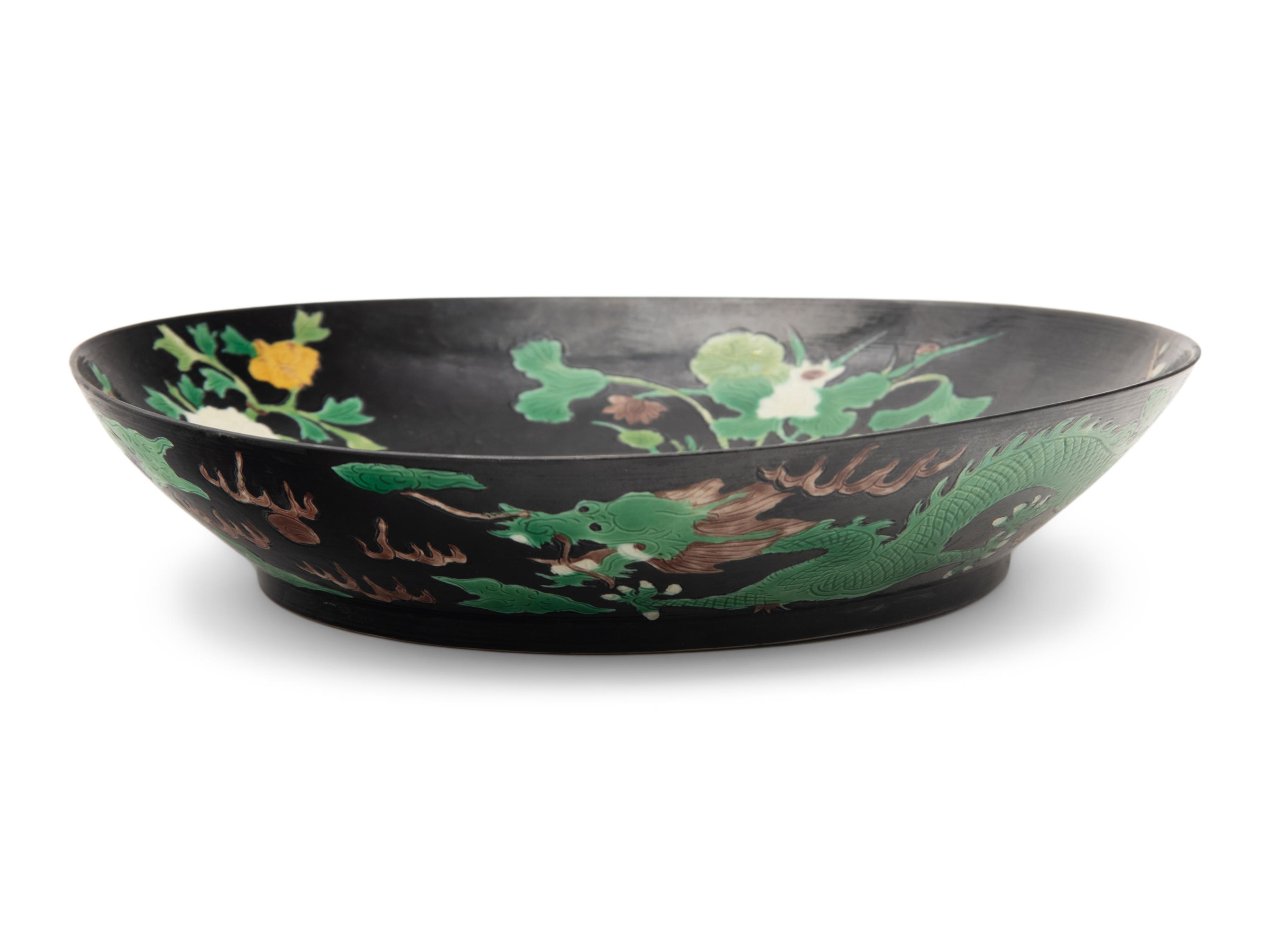 A Chinese Black Ground Famille Verte Porcelain Plate