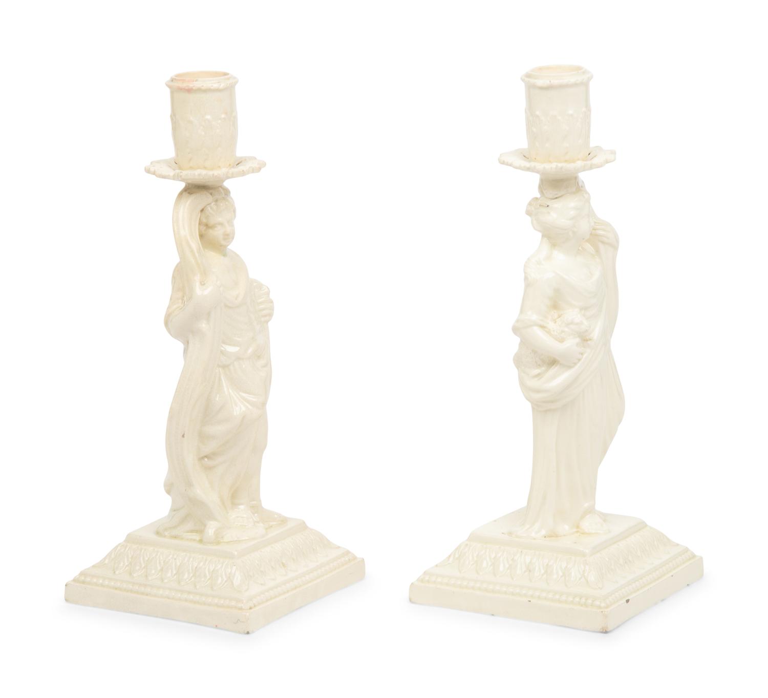 A Pair of English Creamware Figural Candlesticks