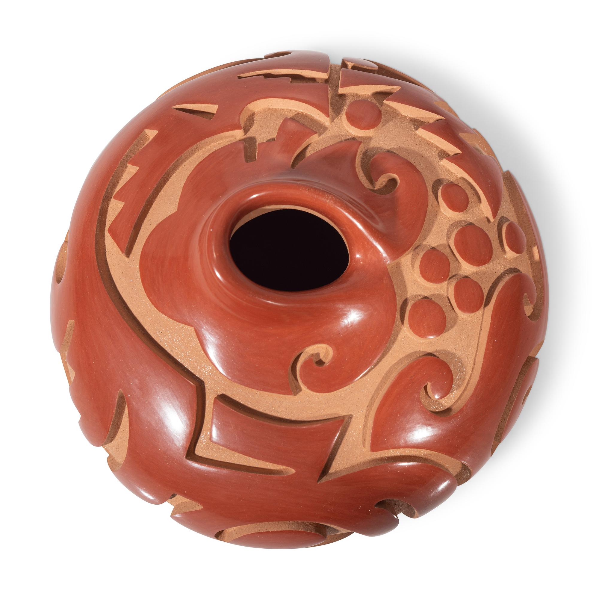 Red and Tan Carved Pottery Vase, with Avanyu