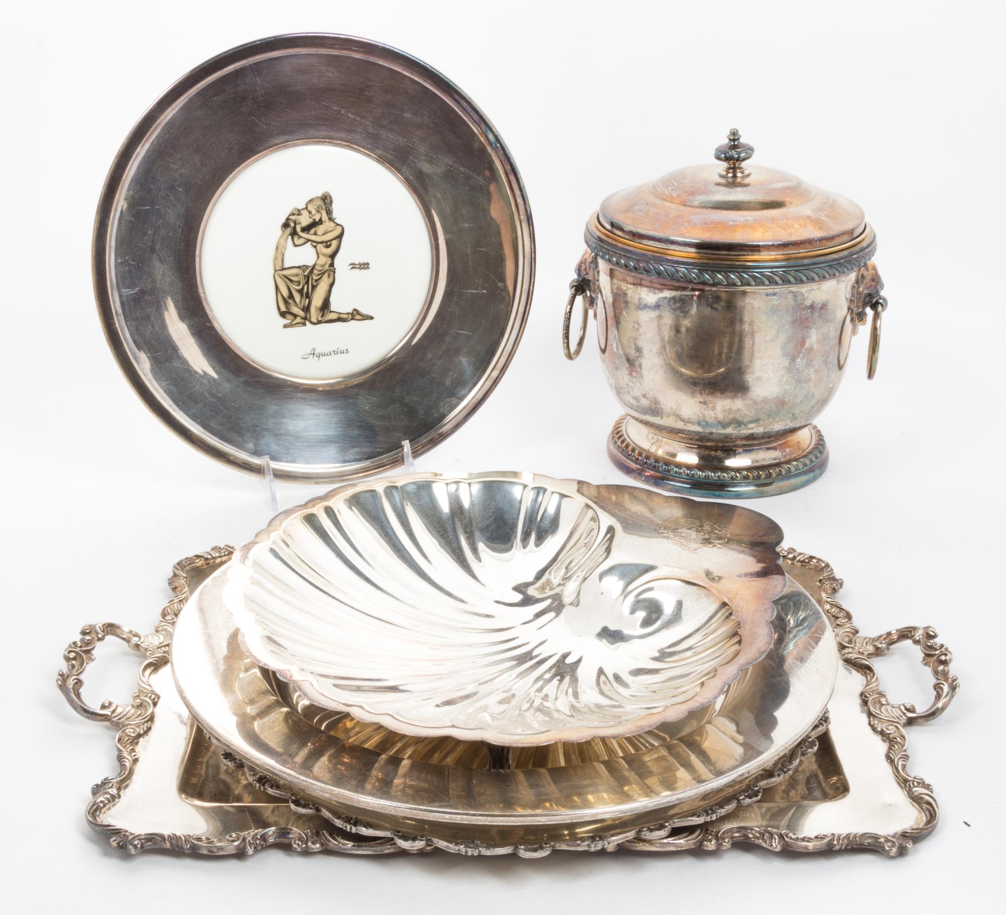 A Collection of Silver-Plate Serving Articles Height of first 8 3/4 inches.