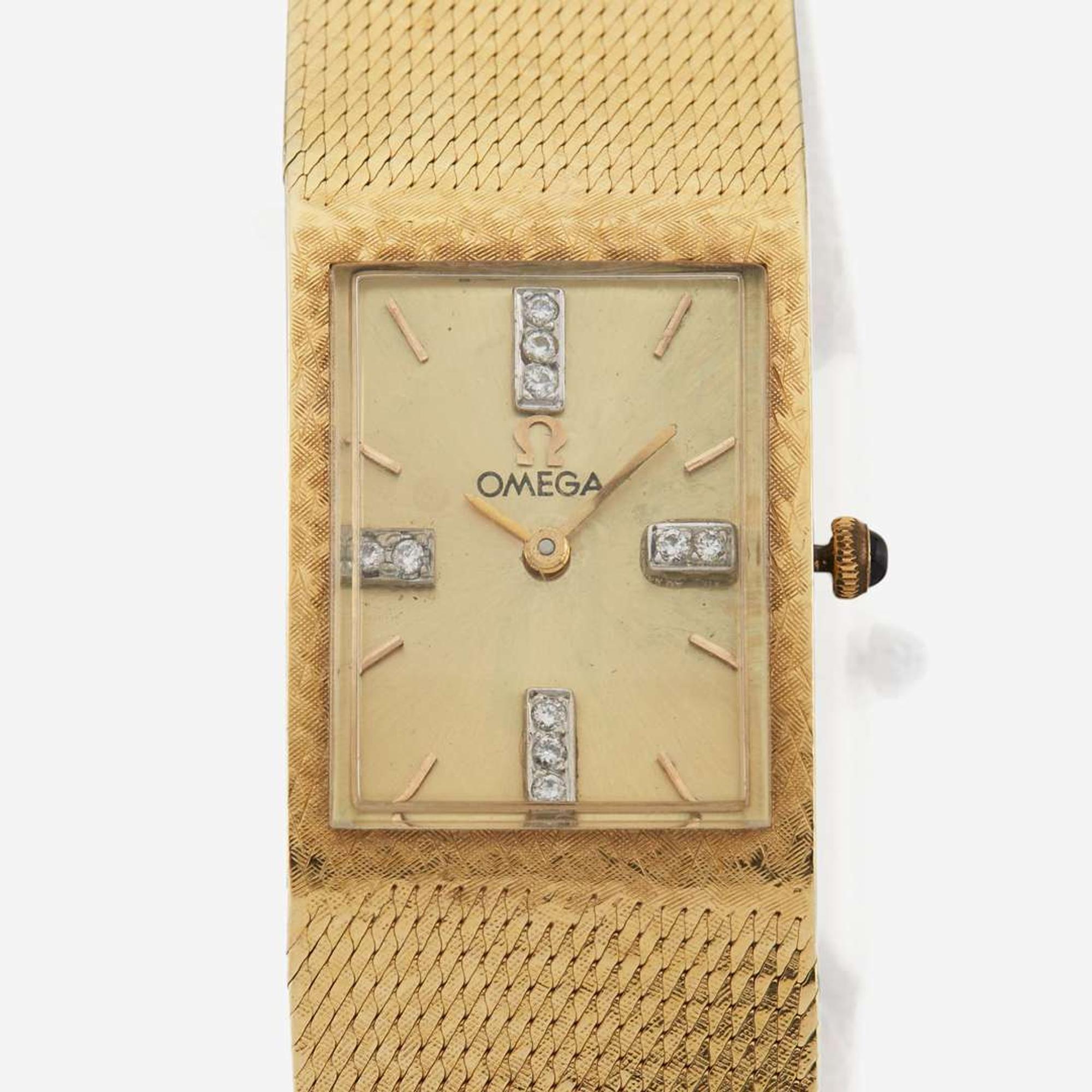A gentleman's fourteen karat gold and diamond bracelet wristwatch, Omega
