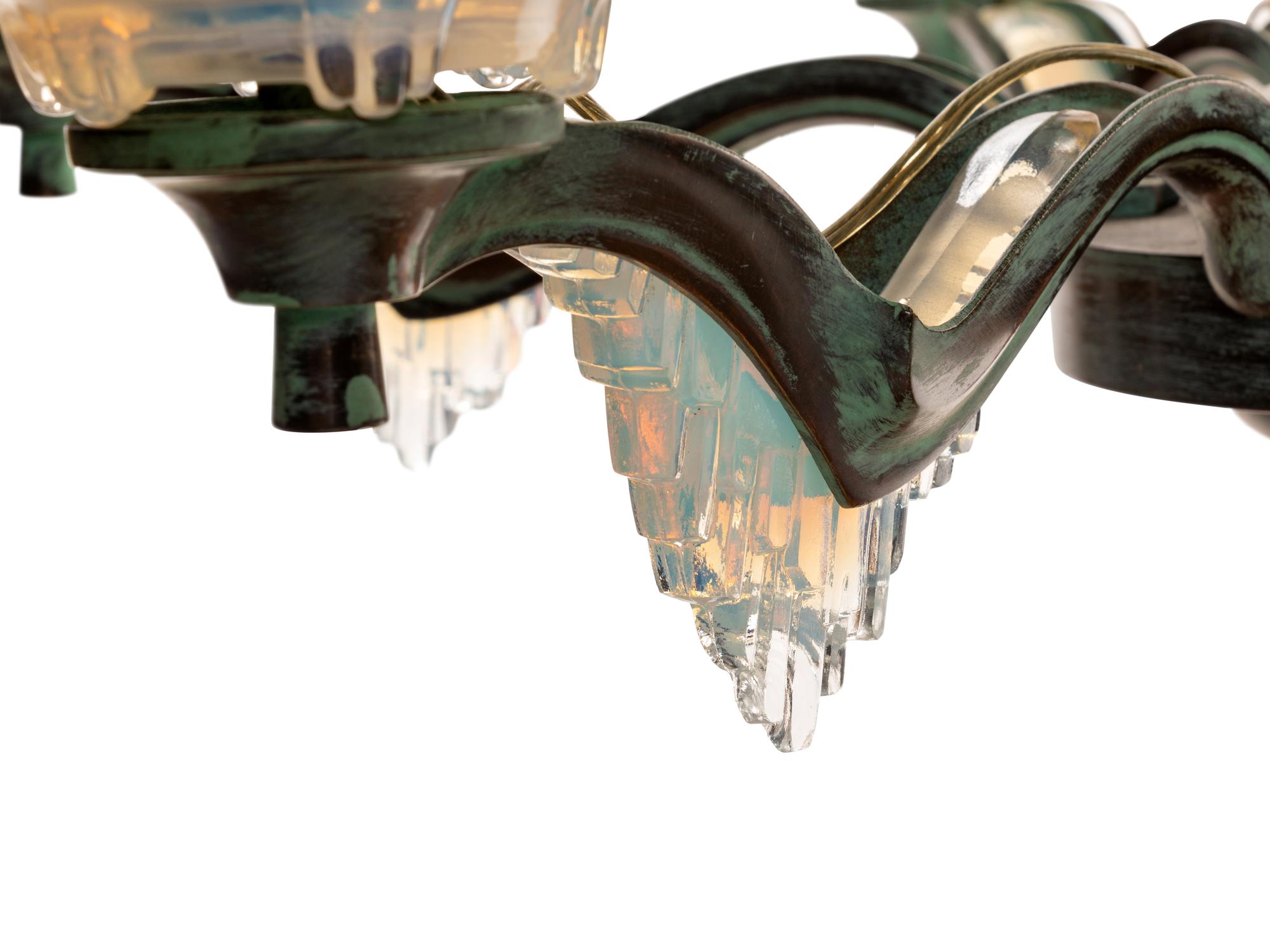 A French Frosted Glass and Patinated Metal "Icicle" Chandelier in the Manner of Ezan