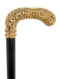An American Presentation 14 Karat Gold Handled Cane, Length of handle 5 x length overall 34 inches.