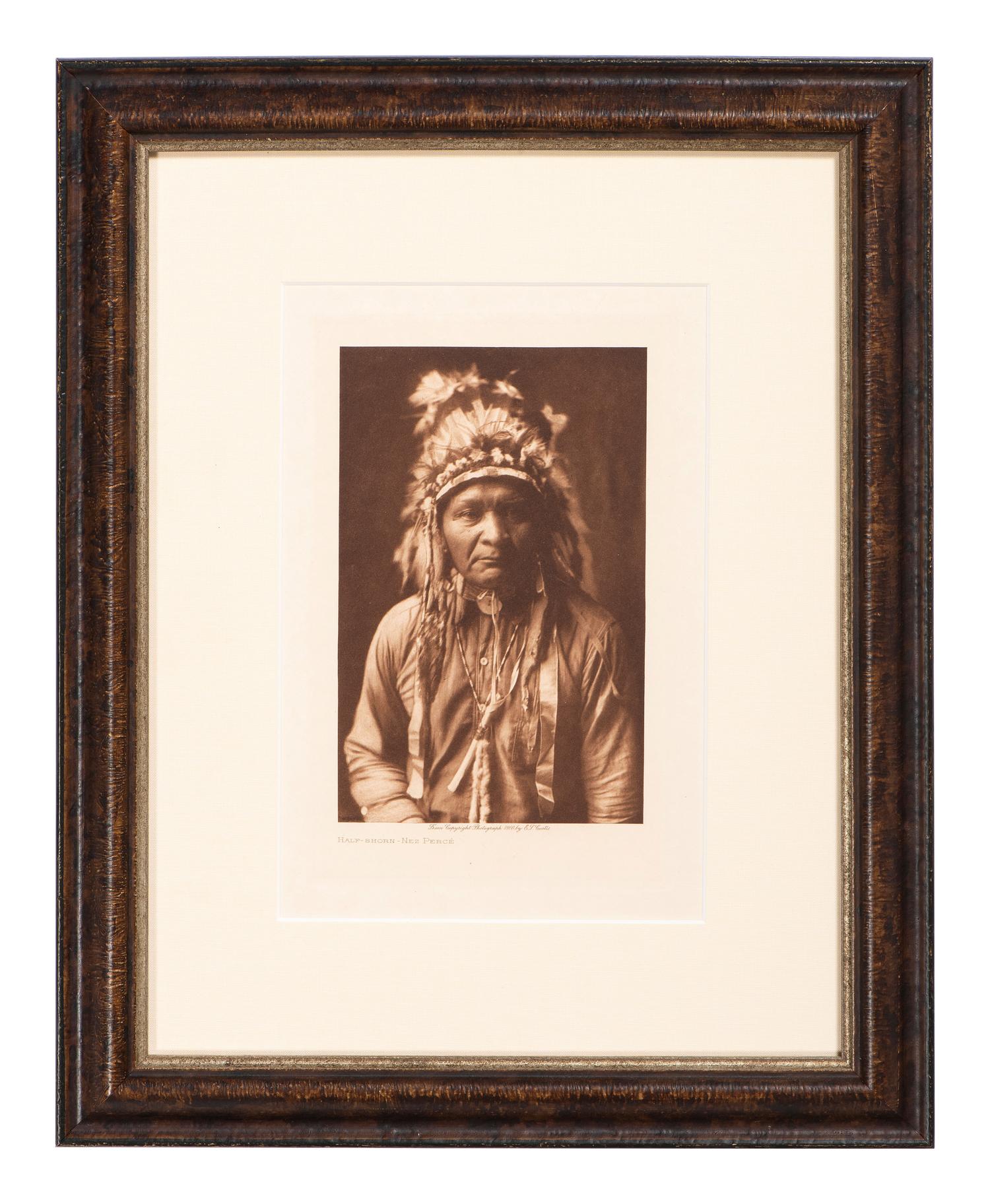 CURTIS, Edward (1868-1952), photographer. Volume photogravure of Half-Shorn - Nez Perce.