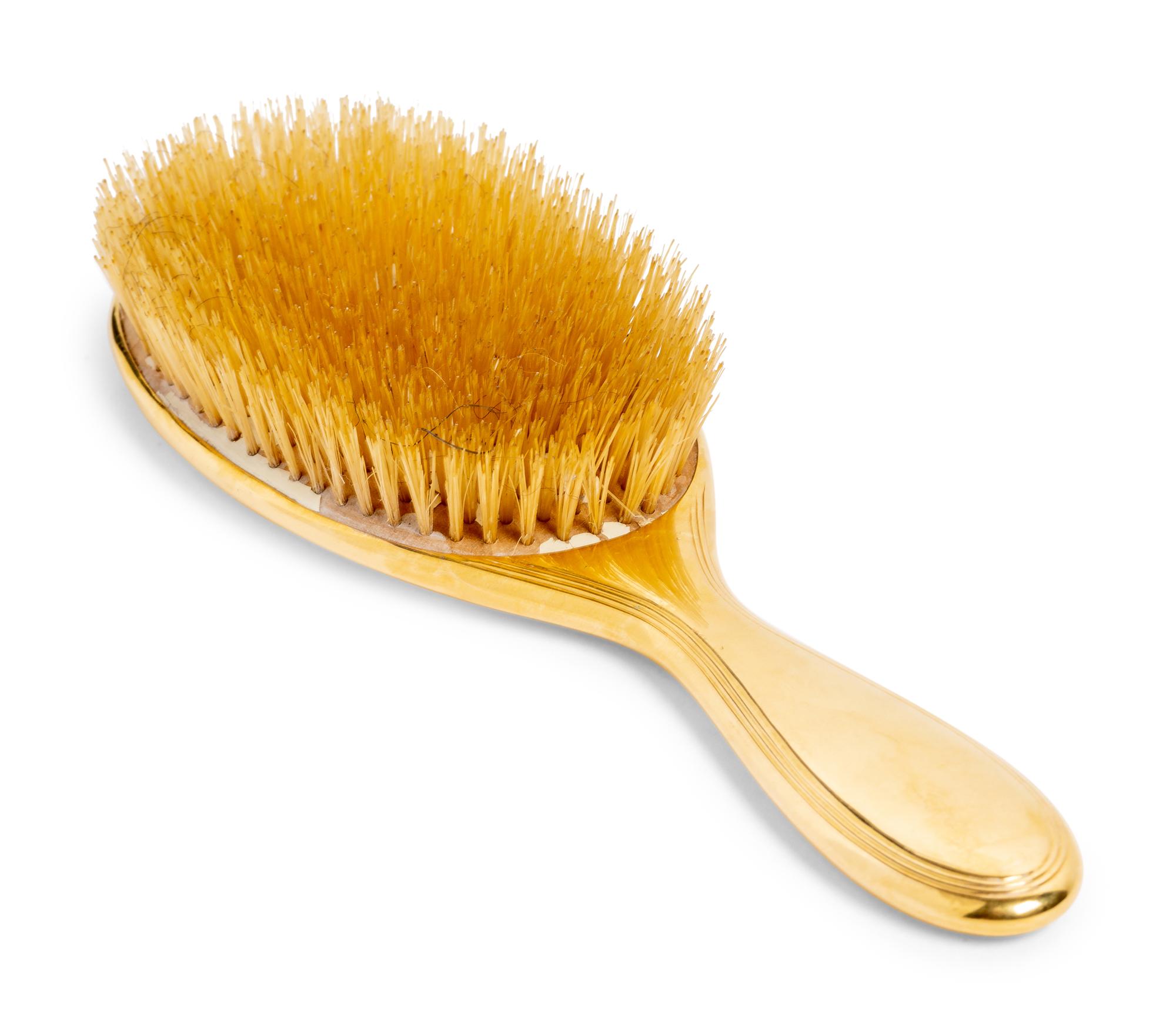 A Tiffany and Co. 18-Karat Yellow Gold Brush