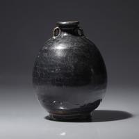 A Chinese Black Glazed Ovoid Jar, Jin/Yuan Dynasty — 金/元 黑釉雙耳罐