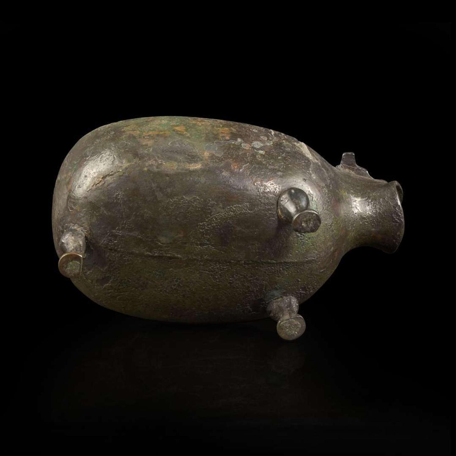 A Chinese archaic bronze animal-form pouring vessel, Yi 青铜兽形匜 Late Eastern Zhou period ????