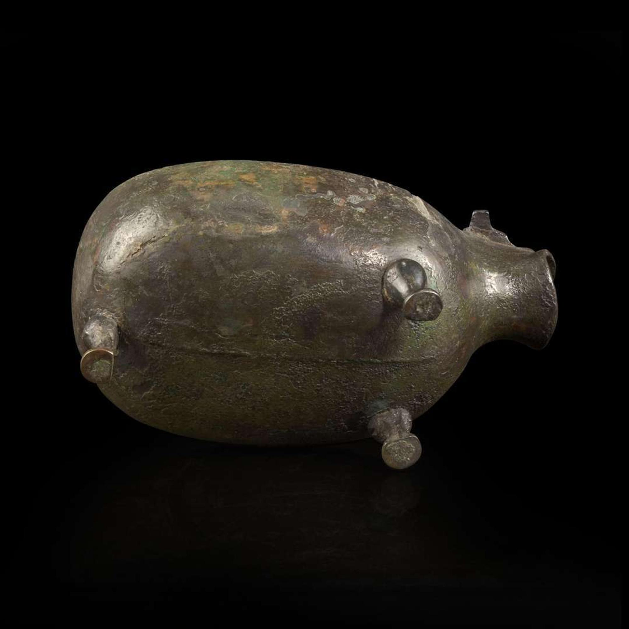 A Chinese archaic bronze animal-form pouring vessel, Yi 青铜兽形匜 Late Eastern Zhou period ????
