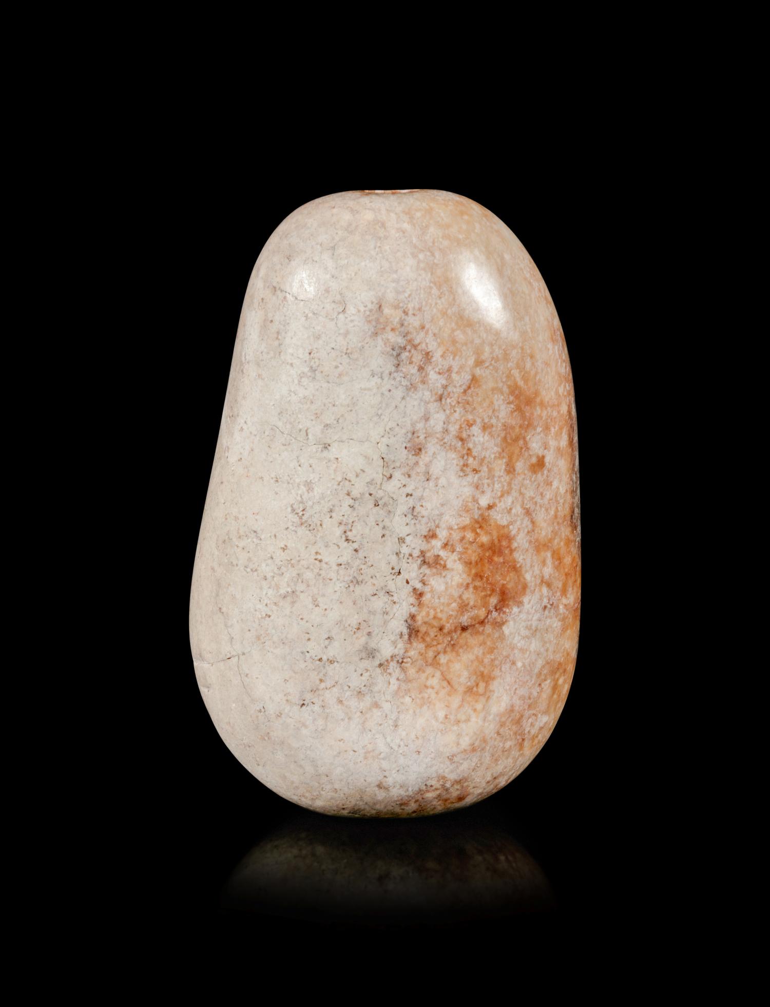 A Burned Jade Pebble-Form Snuff Bottle