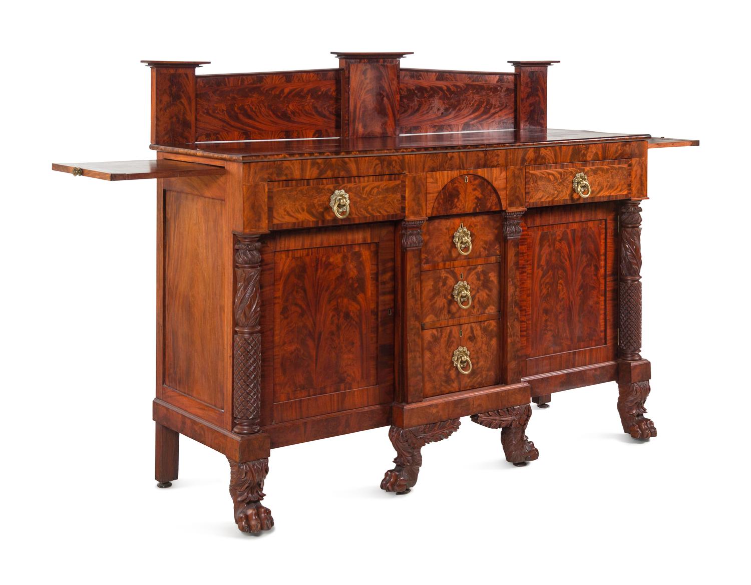 A Late Classical Carved and Highly Figured Mahogany Sideboard