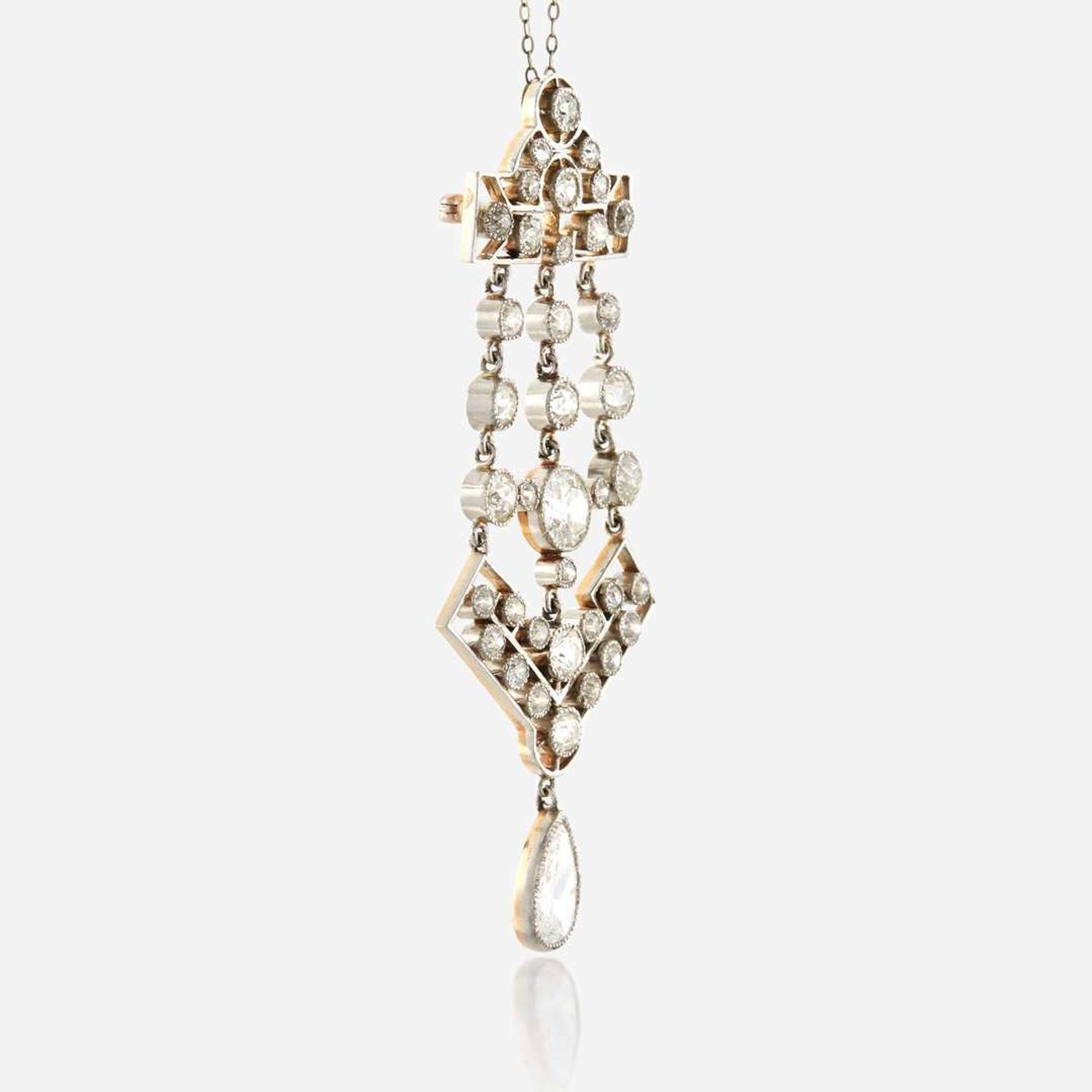 A diamond and platinum topped gold pendant