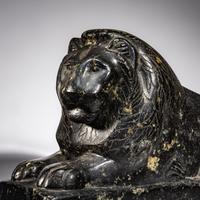 An Egyptian Black Marble Recumbent Lion