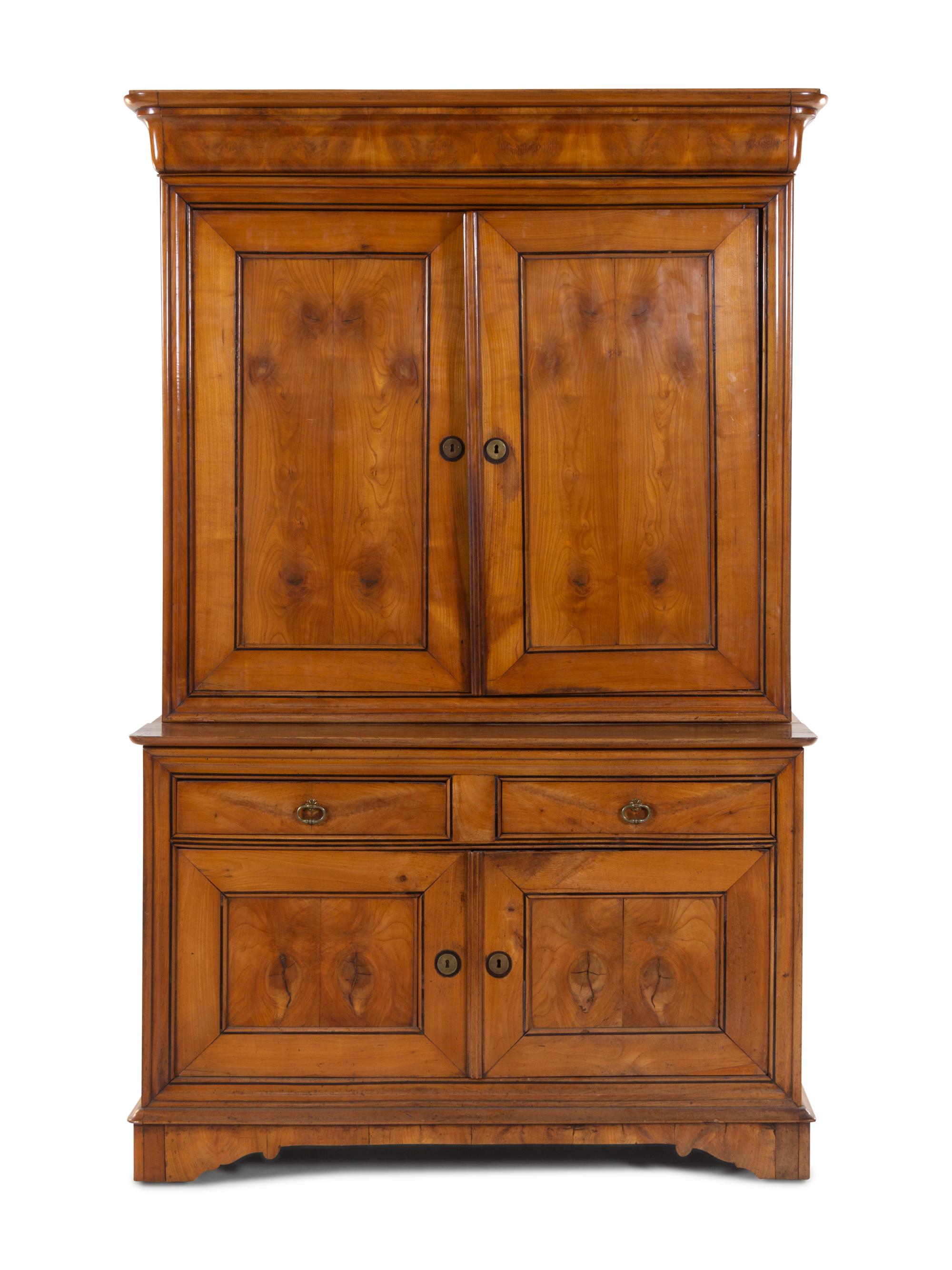A Louis Philippe Fruitwood Cabinet