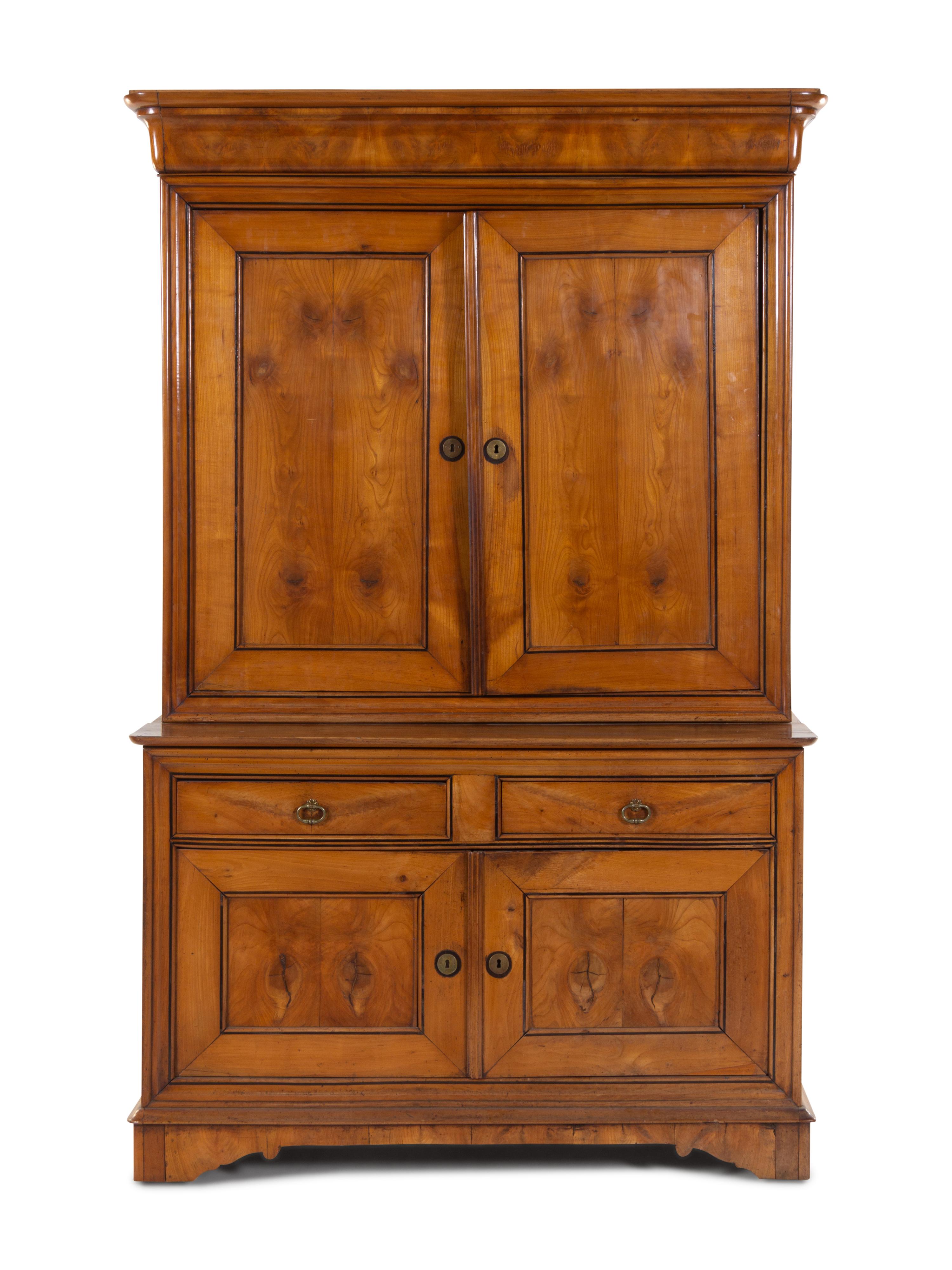 A Louis Philippe Fruitwood Cabinet