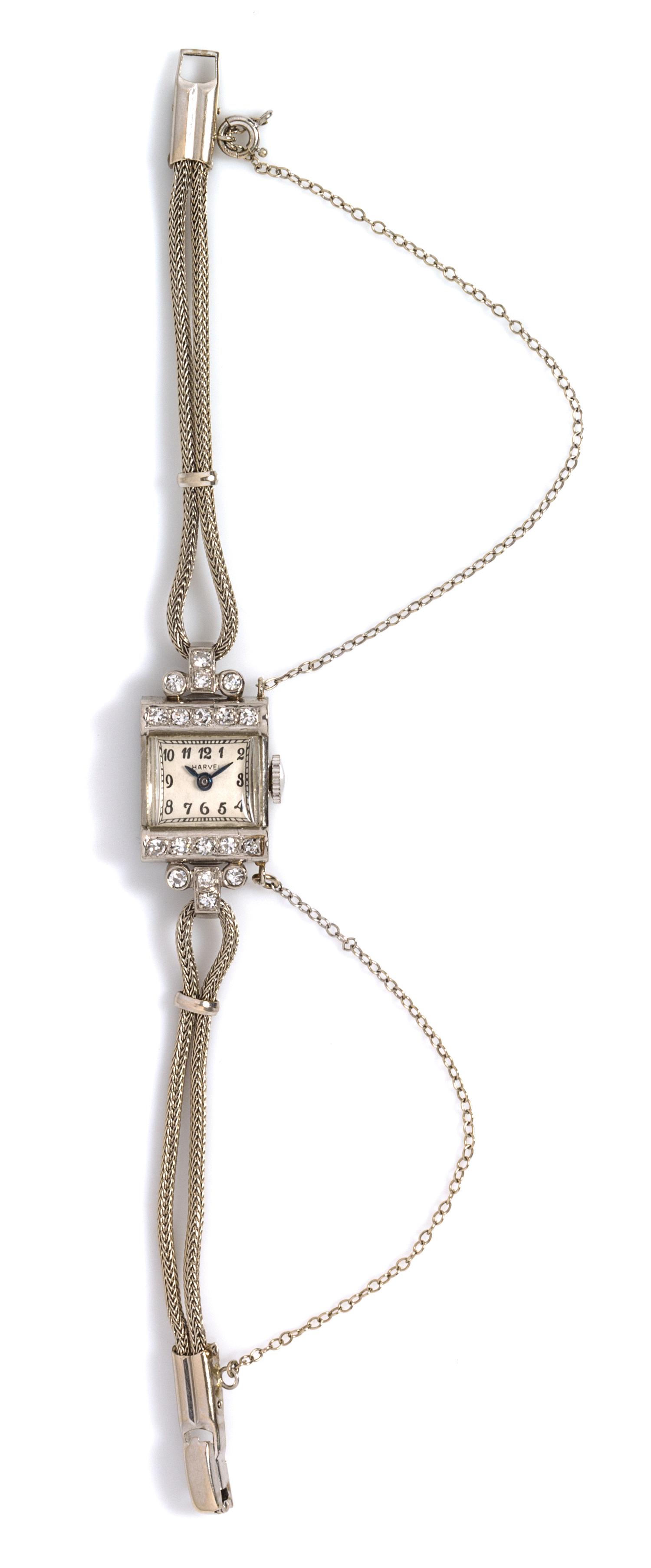 A Retro Platinum, Ruthenium, White Gold and Diamond Wristwatch, Harvel, 8.40 dwts.