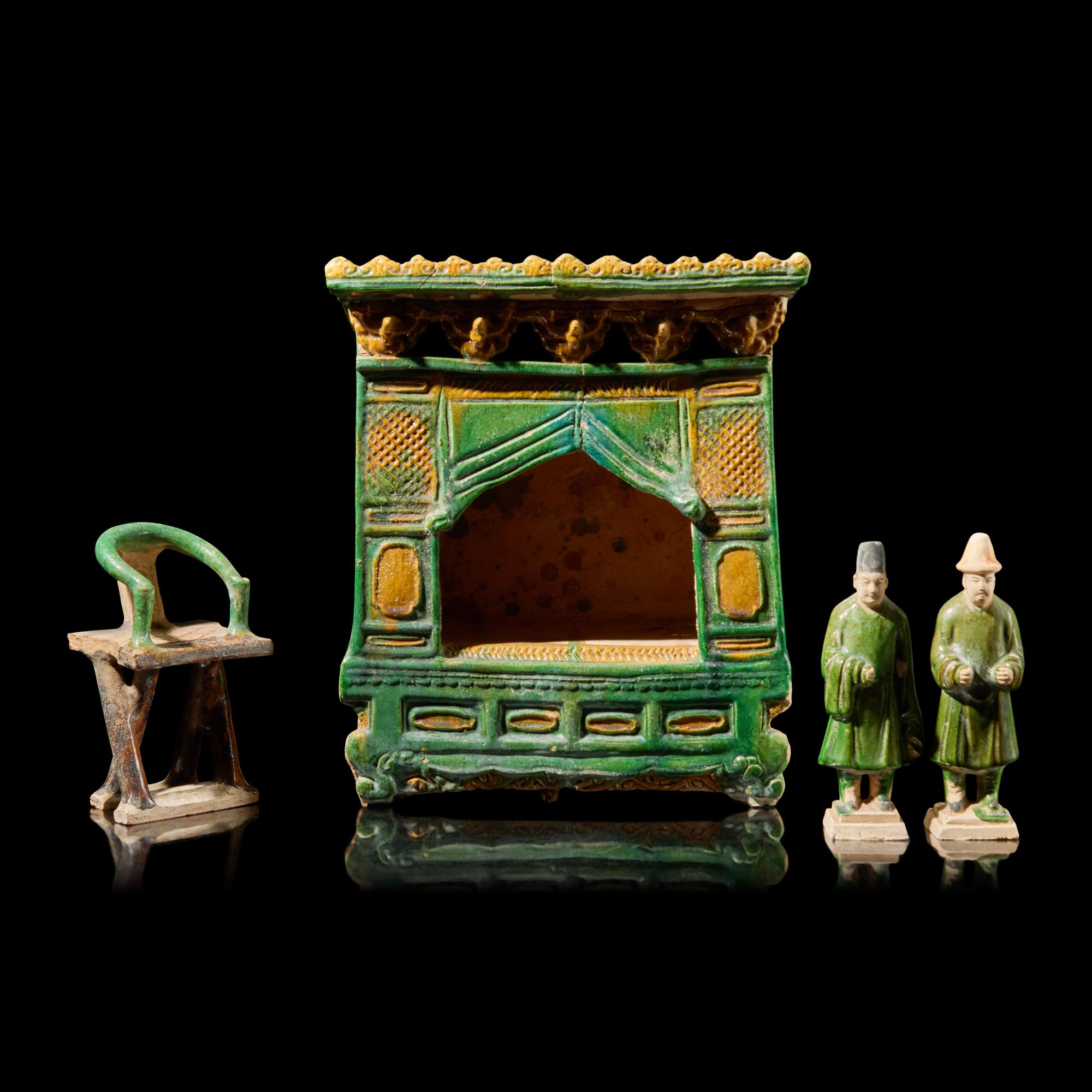 A Group of Four Chinese Sancai Glazed Tomb Wares, Ming Dynasty — 明 三彩交椅、陶俑及床等一組四件