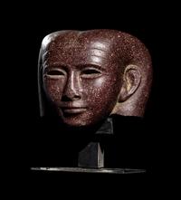 A Roman Porphyry Head of an Egyptian Woman