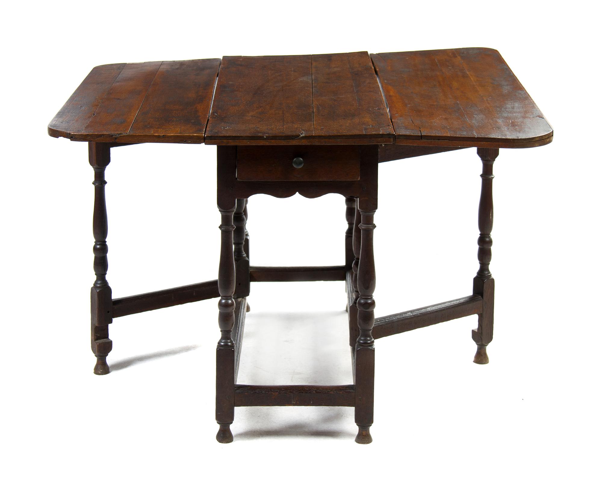 A George I Oak Drop-Leaf Table, Height 28 1/2 x width 42 1/2 inches x depth 16 inches (open).