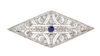 An Art Deco, Platinum, Diamond and Synthetic Sapphire Brooch, 4.80 dwts.