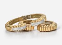 A Pair of Matching 18K Yellow Gold Bangle Bracelets with Diamonds